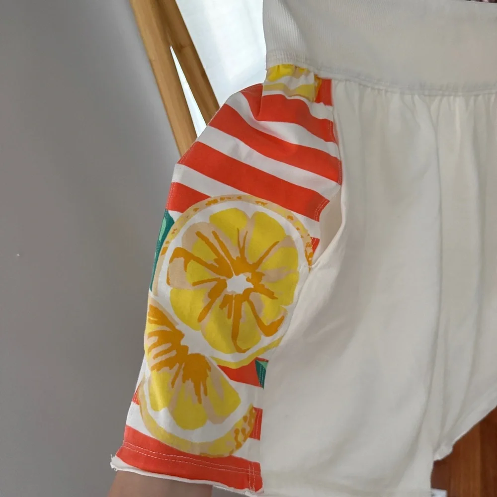 Free People White Tennis Shorts with Orange Stripe and Green Waistband